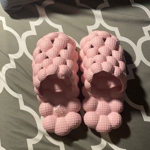 I am selling these pink trendy bubble slides. They are brand new and untouched.